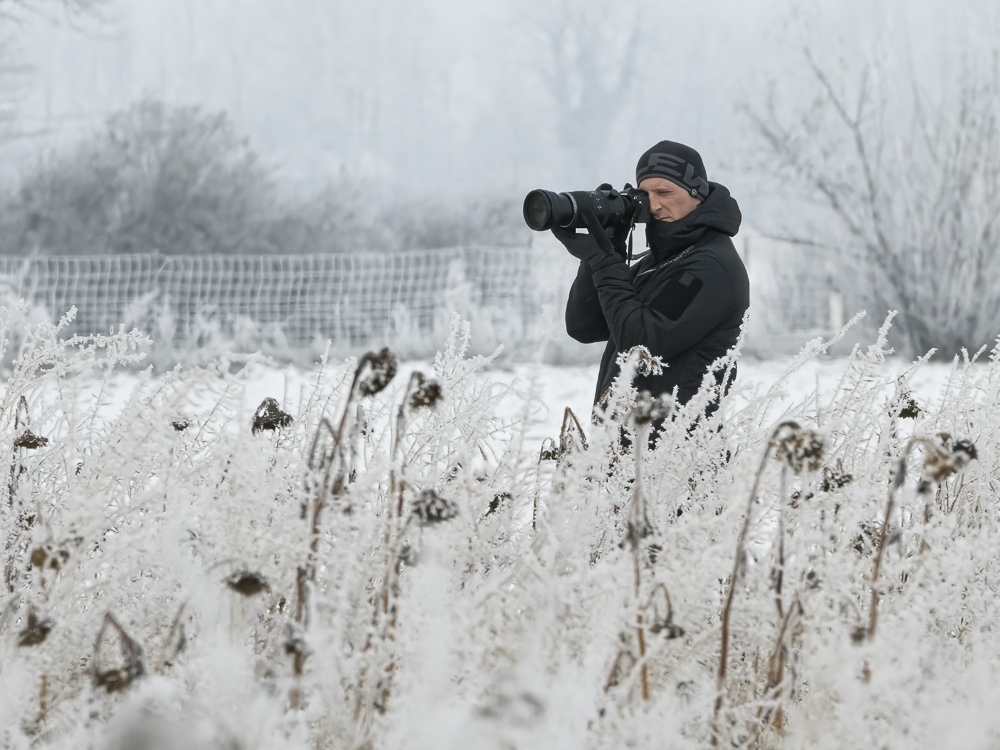 Tobias Brehm while photographing in icy conditions